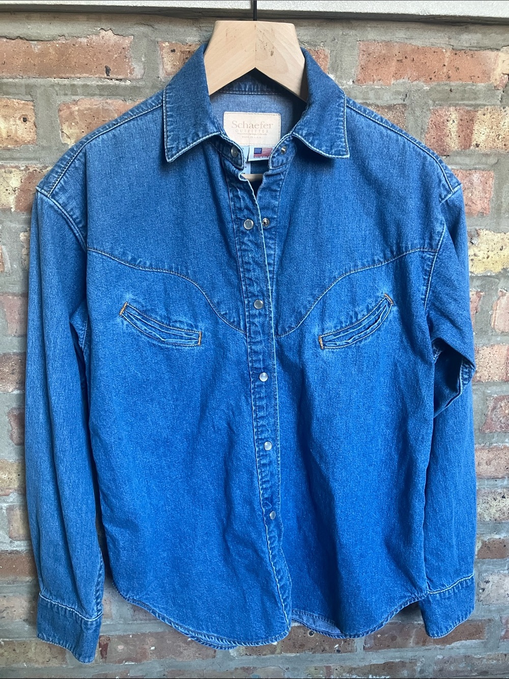 Schaefer Outfitter Western Pearl Snap Cowboy denim long sleeve shirt.